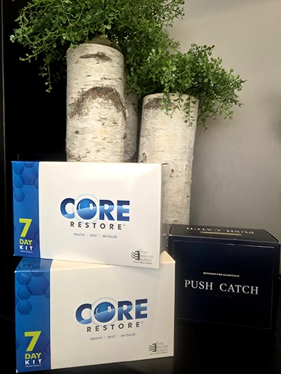 Chiropractic Schaumburg IL Detox Programs Core Restore 7 Day kits displayed on a shelf