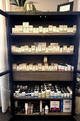 A cabinet full of supplements available for purchase